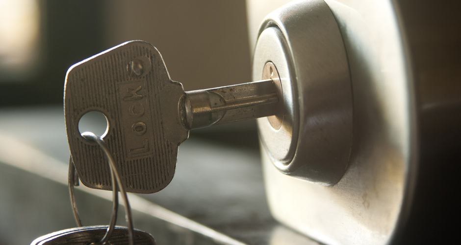 Photo of a key in a lock